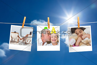 Composite image of instant photos hanging on a line
