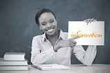 Happy teacher holding page showing information