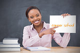 Happy teacher holding page showing career school