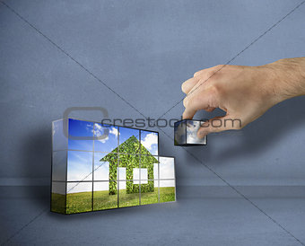Composite image of hand building wall