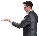 Businessman presenting with hand