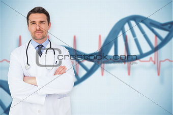 Composite image of handsome young doctor with arms crossed
