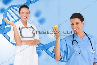 Composite image of happy female medical team