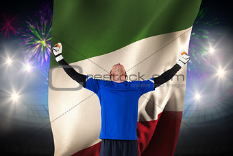 Composite image of goalkeeper celebrating a win