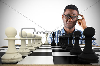 Composite image of confused casual businessman