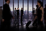 Composite image of business colleagues looking