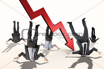Composite image of businessmen burying their heads