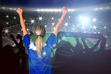 Composite image of cheering football fan in blue