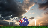 Composite image of football in australia colours