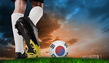 Composite image of football boot kicking korea republic ball