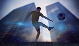 Composite image of football player in yellow kicking