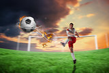 Composite image of football player in white kicking