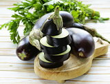 fresh ripe vegetables purple eggplant on a wooden table