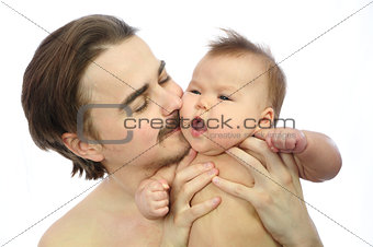 Dad smelling newborn baby