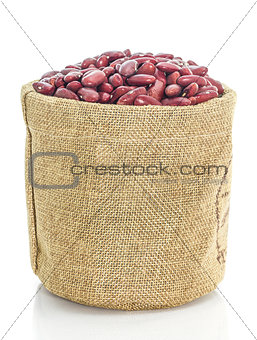 Kidney beans in Sacks fodder on white background