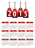 Spanish calendar for 2015 year with red hanging glossy tags