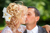 beautiful young wedding couple kissing