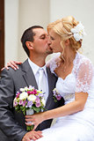 beautiful young wedding couple kissing