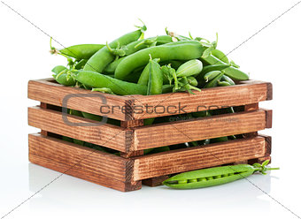 Green peas in wooden box