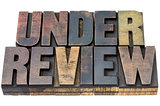 under review in wood type