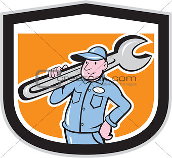 Plumber Holding Wrench Shield Cartoon