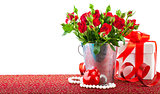 Bunch red roses with gift and heart