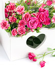 bouquet pink roses in wooden basket