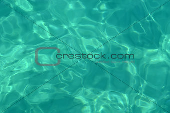 Turquoise water surface in the pool