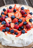 Pavlova cake with fresh berries