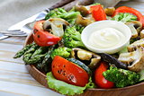 appetizer of grilled vegetables (bell peppers, asparagus, zucchini, broccoli)