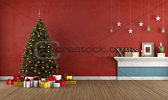 Old red room with christmas tree