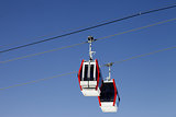 Two gondola lifts close-up view
