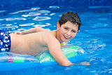 Boy in swimming pool