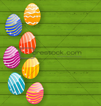 Easter colorful eggs on wooden texture
