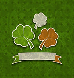 Holiday background with clovers in Irish flag color for St. Patr