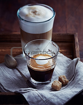 Glass of Espresso Macchiato and Latte Macchiato