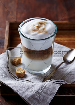 Glass of Latte Macchiato with Brown Sugar