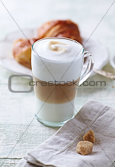 Glass of Latte Macchiato and Croissant with Rhubarb Jam