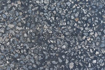 Dark asphalt surface much relief
