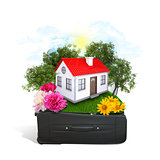 House, trees and green grass in travel bag