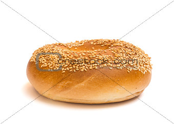 Sesame seed bagel isolated on a white background
