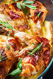 Baked chicken on potatoes