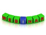 Inscription on the cubes of green and blue: webinar