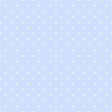 Tile vector pattern with white polka dots on a pastel blue background.