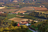 Rural house and autumnal fields in Italy.