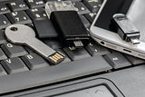 USB  and micro USB keys with  smartphone on the laptop keyboard