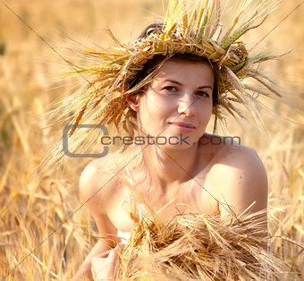 woman in field of wheat