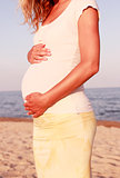 pregnant woman on the beach 