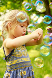 little girl with soap bubbles 