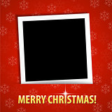 Merry Christmas greeting card with blank photo frame